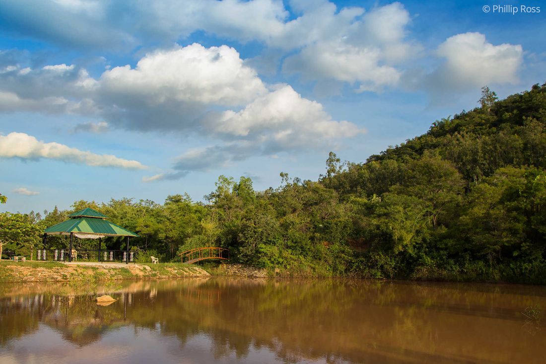 The gazebo and bridge at The Outback Farm and Homestay under an open sky